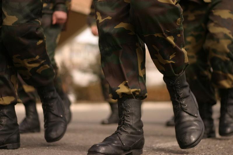 Warrant officer fired for beating soldier